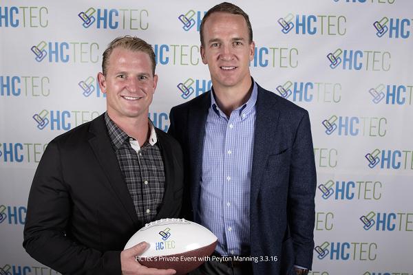 D1 Training Franchisee Will Bartholomew pictured with Peyton Manning
